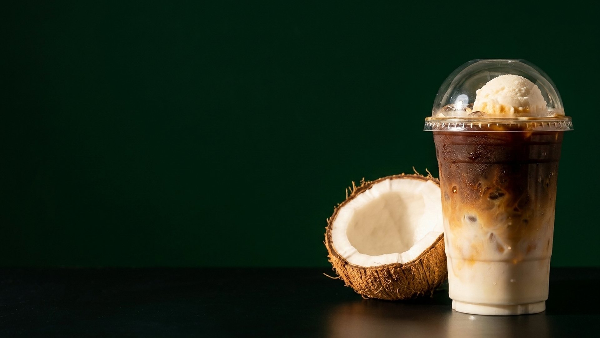 Coco’s Coconut Coffee beside a fresh coconut